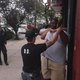 Screenshot of video footage of police attempting to handcuff Eric Garner that shows an officer placing him in a choke hold
YouTube